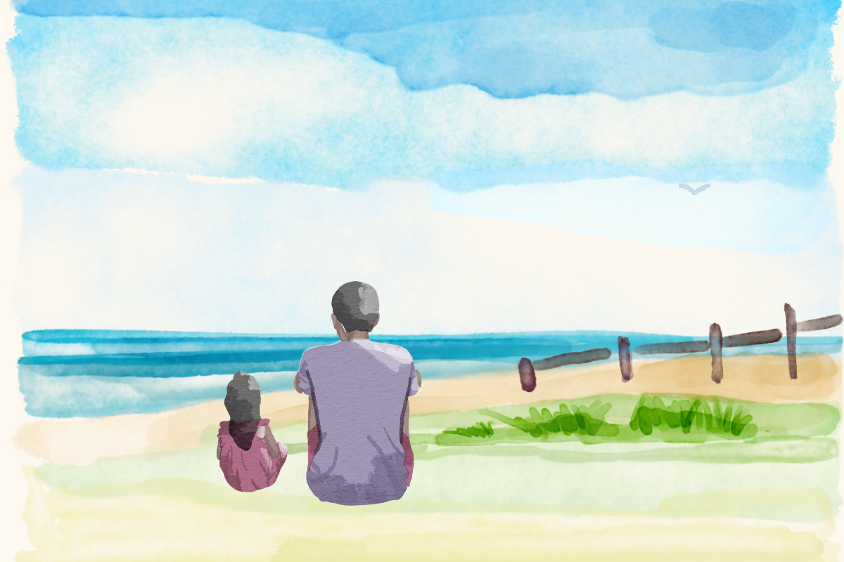 A parent standing at the edge of the sea at dusk, watching the water.