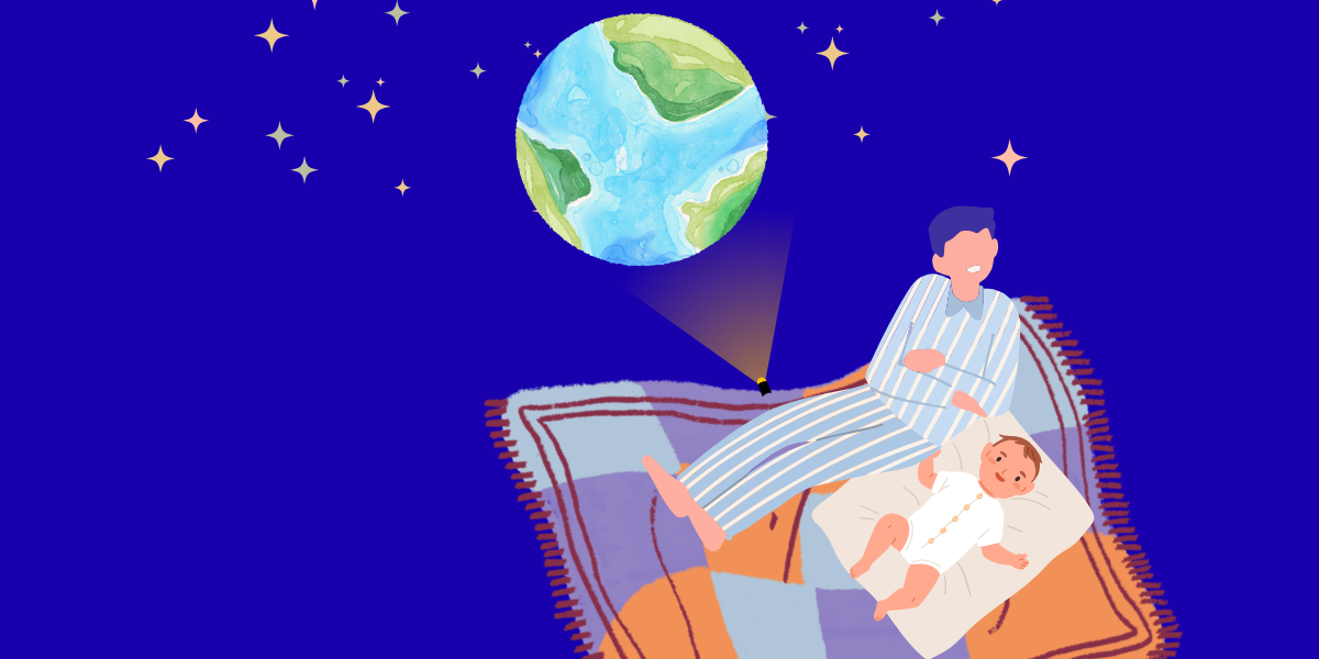 A parent and toddler lying on a patterned blanket at night, a small sky projector beside them casting a glowing Earth onto a starry sky above.